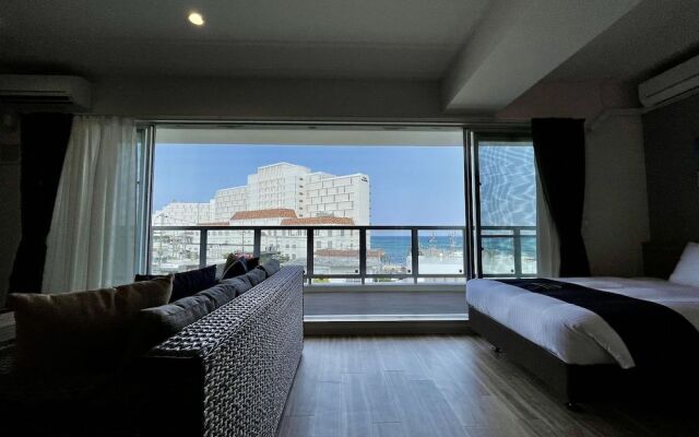 Coral Palace Onna by Sunset Avenue