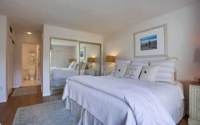 Coastal Chic Furnishings Condo Steps to Beach SBTC 128 by RedAwning