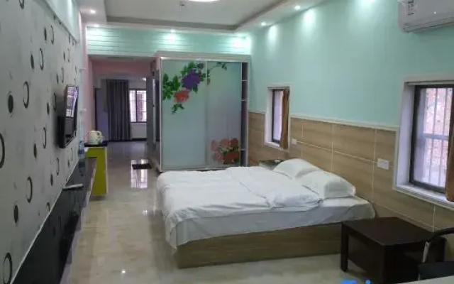 Shangqiu Jinxiu Apartment Hotel
