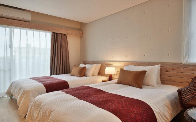 Yomitan Condhotel ND – Guest Rooms – Yomitan