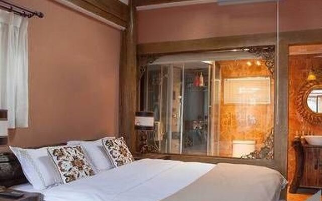 Lijiang Sancunriguang Inn
