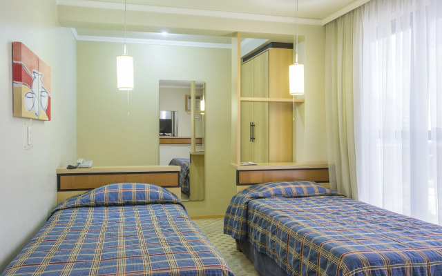 Astron Suítes São José dos Pinhais by Nobile