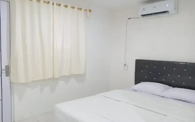 Capital O 93728 Guest House Cemara