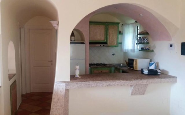 House with 3 bedrooms in Cannigione with wonderful sea view enclosed garden and WiFi 600 m from the beach