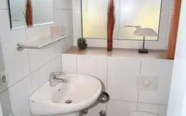 Ferienwohnung "Windflüchter", Gartenweg 5