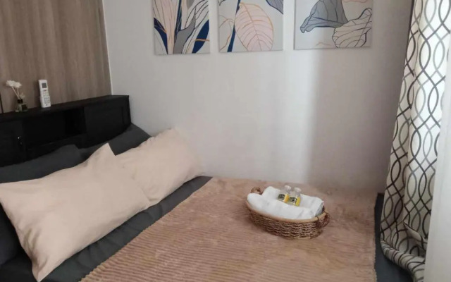 Cozy 1BR with balcony at Fame Residences