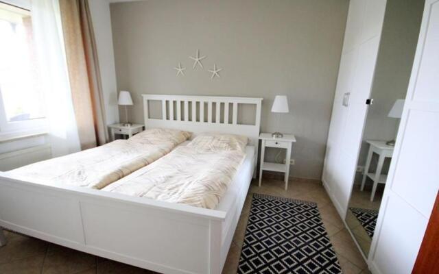 Ferienwohnung-9-mit-Terrasse-Garten-Landhaus-Hubertus-Duhnen