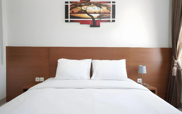 Capital O 1974 Grand Parigi Hotel