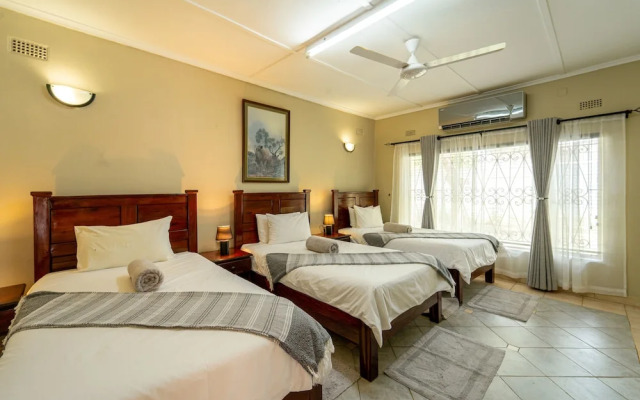 "room in Lodge - Zambezi Family Lodge - Rhino Room"