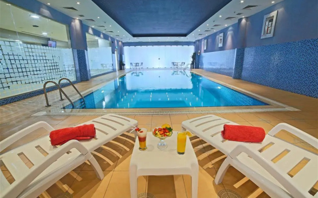 Golden Tulip Suites Breida Al Q