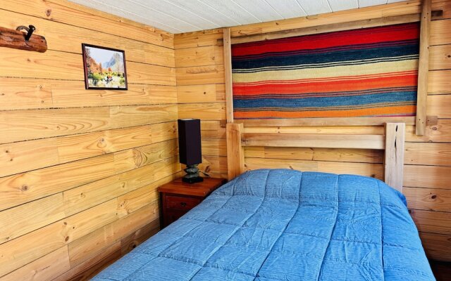 Cabañas entre montañas con tinajas calientes