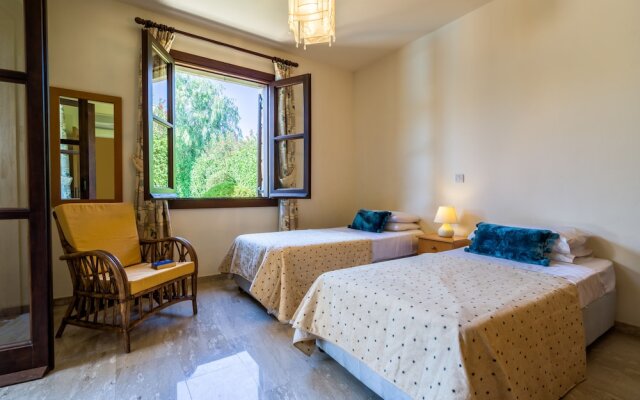 3 bedroom Villa Anarita 64 with private L-shaped pool, beautiful gardens, near resort village square