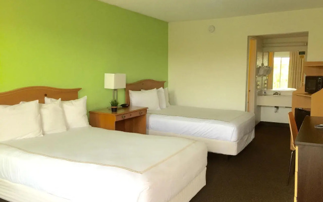 Roomba Inn & Suites Orlando