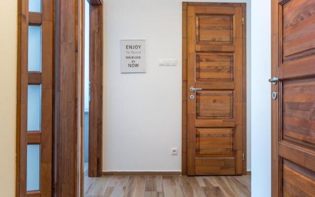 Aqualiget-Apartmanház
