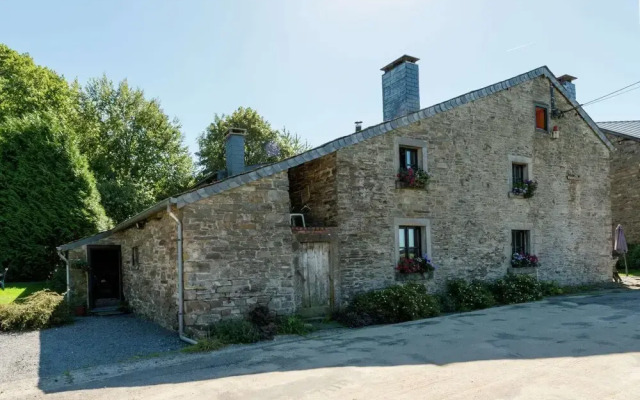 Farmhouse Situated at the Edge of the Woods