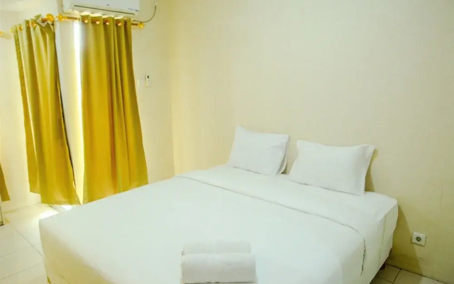 Modern Studio Grand Serpong Apartment By Travelio