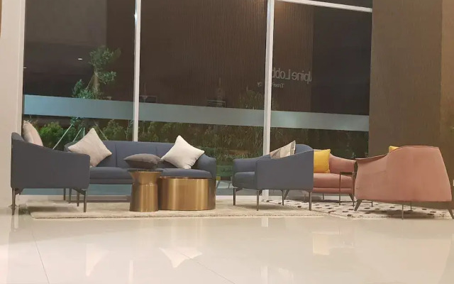 Alpine Room at TreePark City Apartement