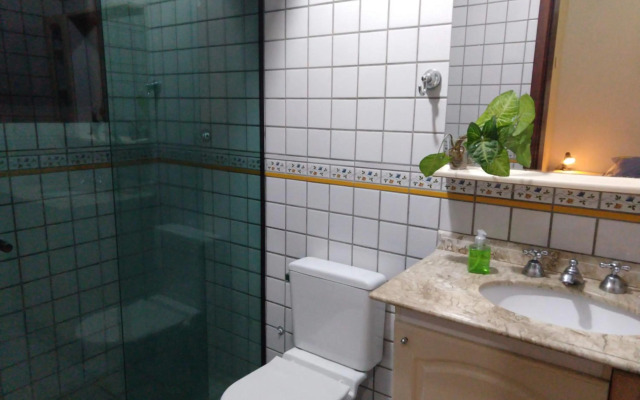 Casa 5 suítes com piscina e churrasqueira