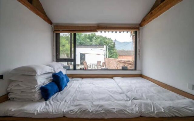 Xiang Chun Tree House Inn