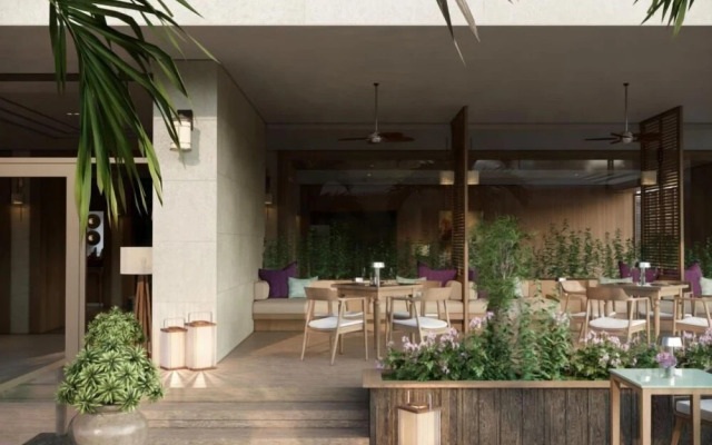 Signature By M Village Beachfront Hotel