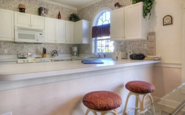 Magnolia Place 102 4765 2 Br condo by RedAwning
