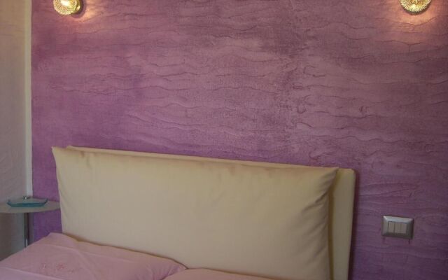 Room in Guest Room - S'olivariu Village Affittacamere - King Room With Roll-in Shower