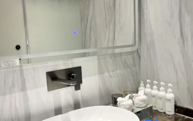Mehood Lizi Hotel (Liuzhou City Center Wanda Malu Mountain Branch) – Bathroom – Liuzhou