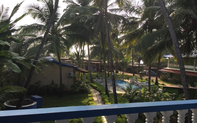 Morjim Coco Palms Resort