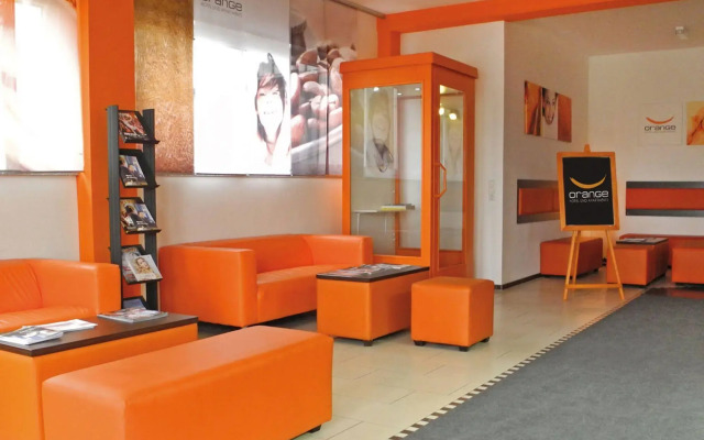 Orange Hotel und Apartments