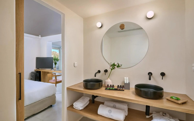 Adorno Beach Hotel & Suites