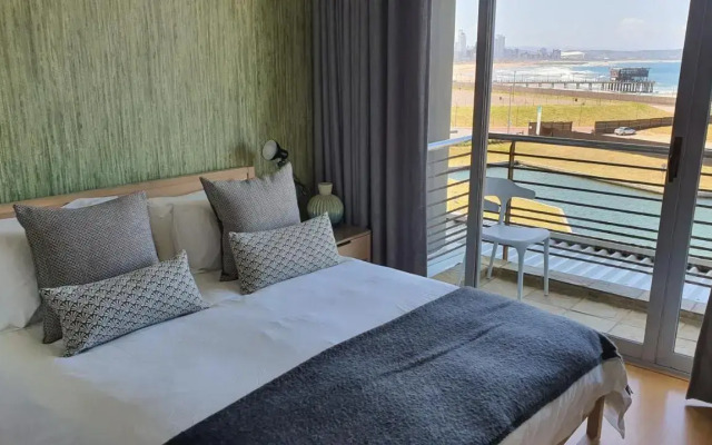 Accommodation Front - Gorgeous 4 Sleeper Beachfront Apartment