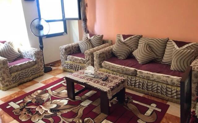 Cozy new 2 BD Amazing beach view Next to Hilton hotel Family only !العائلات فقط