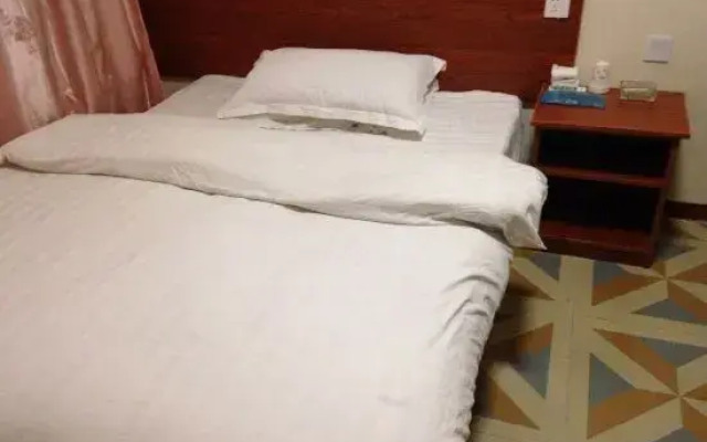 Warm Home Hotel (Nanyang Zhongjing Yinhe Times Square)