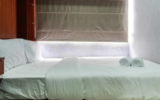 Comfortable 2BR @The Oasis Apartment By Travelio