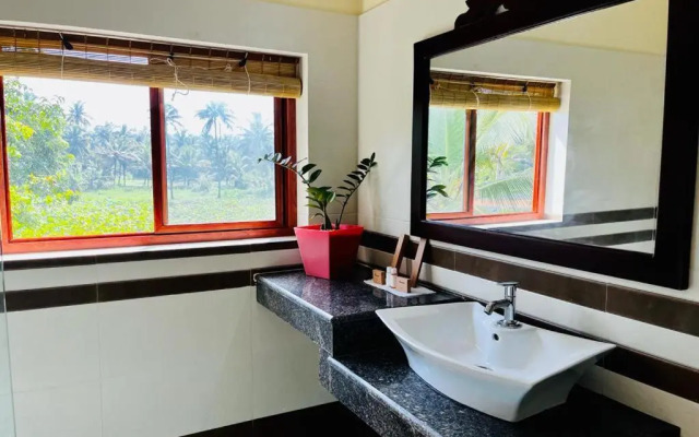 Maadathil Cottages