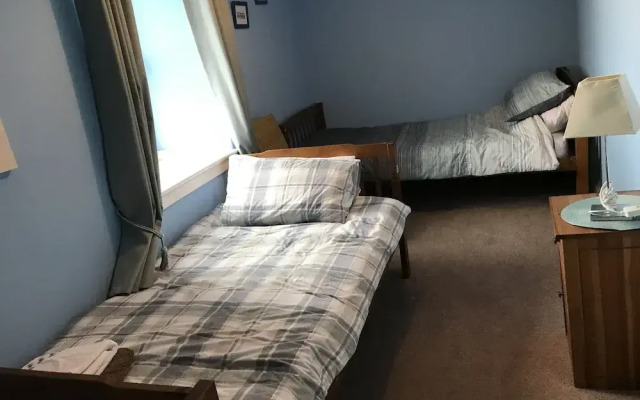 Petfriendly-beachfront-sunsetfacingsunporch-garden