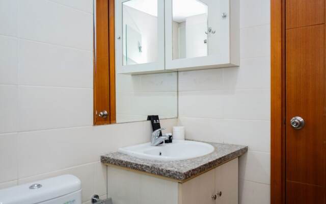 City View 1BR Apartment at Woodland Park Residence