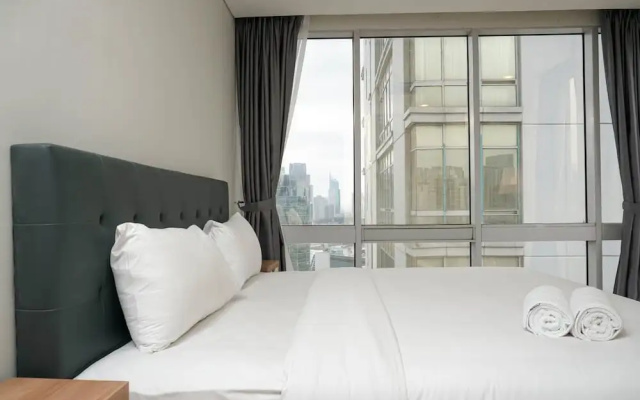Comfortable Deluxe 2BR at The Empyreal Condominium Epicentrum Apartment By Travelio – Guest Rooms – Jakarta