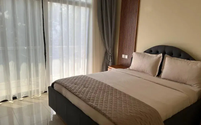 Q-Plus Apartments