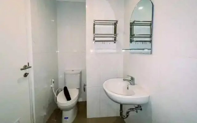 Cozy and Simple Studio Tamansari Skylounge Makassar Apartment By Travelio