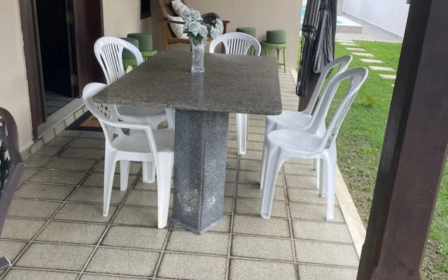 Quarto na praia com cama de casal