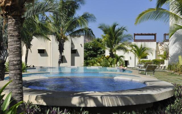 Tropical Gardens - Suites and Apartments