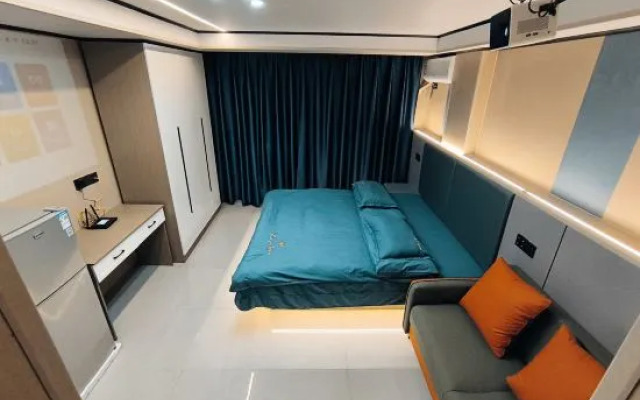 Hengdian Chunai Smart Apartment (Mingqing Gongyuan Branch)