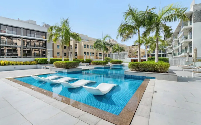 Waves - Stylish 1BR in JVC with Balcony & Pool