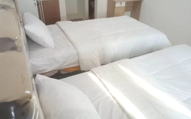 OYO 93866 Neva Guest House SyariahNearWaduk Cipta Karya