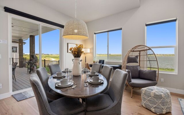 Upscale Waterfront Estate With Mountain Sunset Views