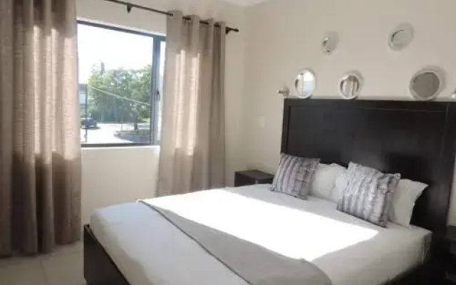The Living Collective Apartments