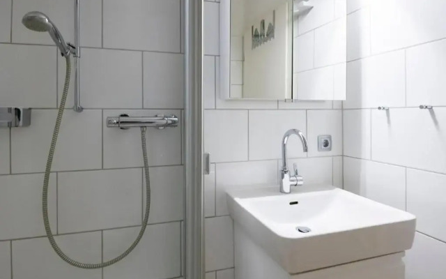 Badeweg 4 Sandkorn 2