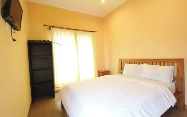 Capital O 94011 Binhari Guest House