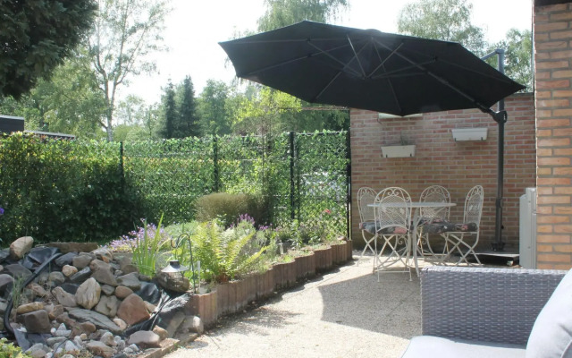Bright Holiday Home in Lanaken near Lake with Garden